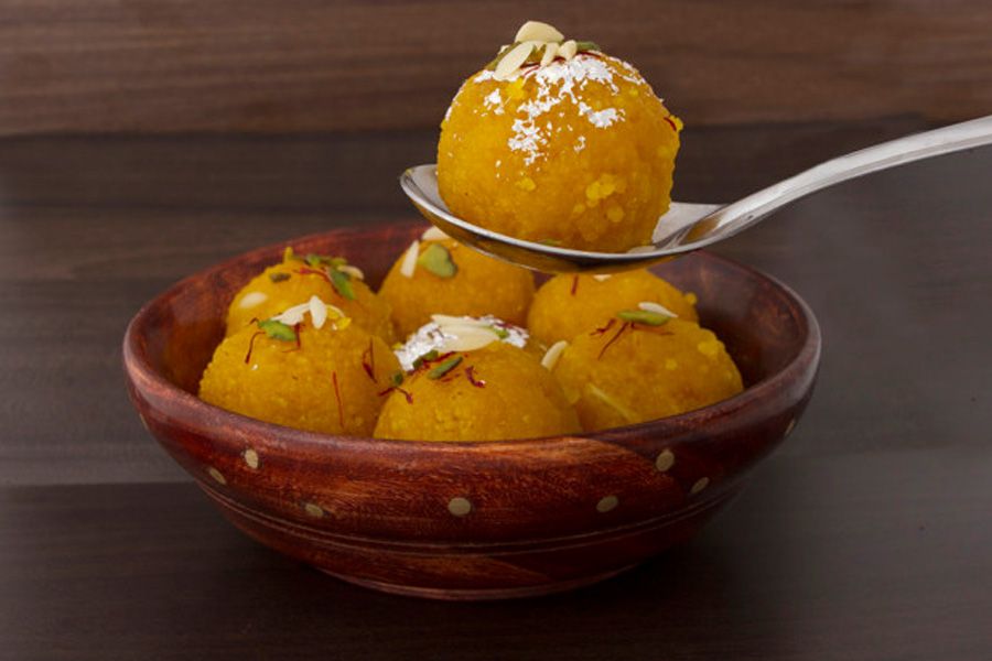 Is it safe for a person with diabetes to eat sweets such as laddoos?